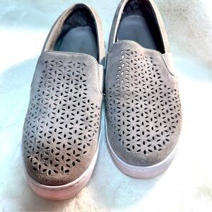 Vionic ladies suede with perforated upper slip on shoe.
